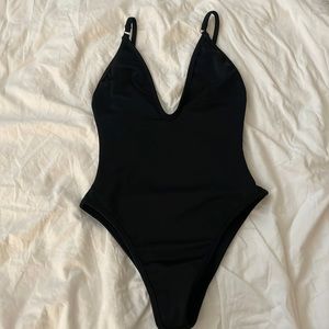 Black one piece swims wear gooseberry seaside high end swim wear